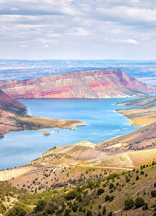 Panoramic view of Sheep Creek Overlook in Manila, Utah near Flaming Gorge National Park with clouds valley and river