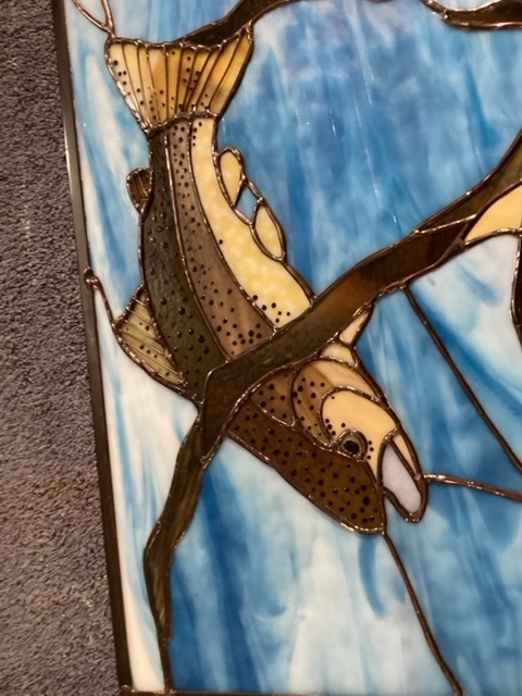 Close-up of the trout's face with dotted detail for realism.